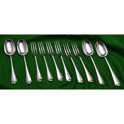 37 - A matching collection of 6x silver forks and 4x silver dessert spoons all with matching crest on han... 