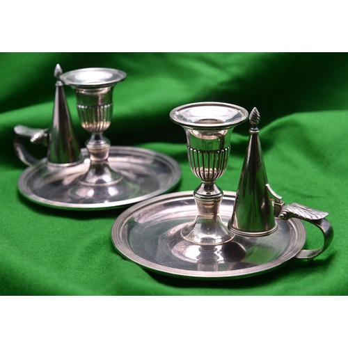 51 - A pair of silver chamber candlesticks with large dish bases, carrying handles, snuffers and removabl... 