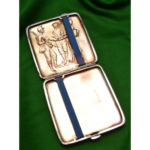 55 - A silver cigarette case with relief decoration of three early 20thC soldiers to lid and gilt wash in... 