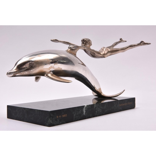 59 - A silver sculpture 'Boy With A Dolphin', London 1979 by David Wynne for Mappin and Webb. A dramatic ... 