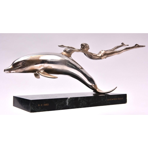 59 - A silver sculpture 'Boy With A Dolphin', London 1979 by David Wynne for Mappin and Webb. A dramatic ... 