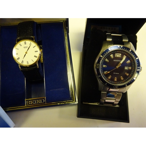 74 - 4x quartz watches. A Seiko chronograph sports watch. A Seiko dress watch. A Sekonda Submariner type ... 