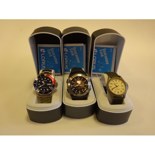 77 - 3x Lorus wrist watches. A Titanium Aviator. A Diver's Light. A Diver's Pepsi with stainless steel br... 