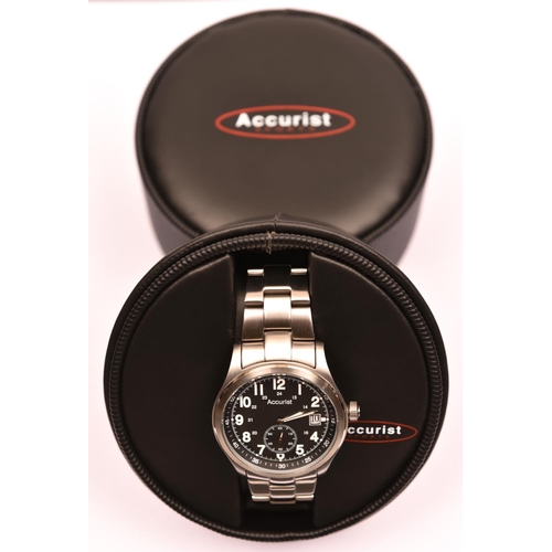 84 - An Accurist Sports MB614 'All Terrain' watch with quartz movement. Black face with separate seconds ... 