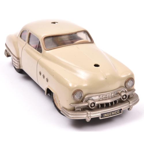 117 - Schuco - Patient-Ingenico 5311 Tinplate 2 Door Saloon. A 1950's American style car in beige with a l... 