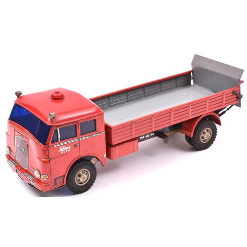 125 - A rare Schuco Elektro-Lastomat 6084 tinplate 2 axle open back M.A.N. Diesel Truck. Cab and rear body... 