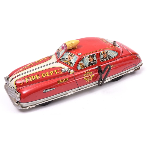 137 - An American 1950's MARX Tinplate Clockwork Fire Chief Car-'with electric signal flasher, siren and p... 