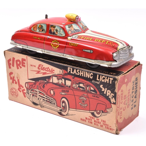 137 - An American 1950's MARX Tinplate Clockwork Fire Chief Car-'with electric signal flasher, siren and p... 