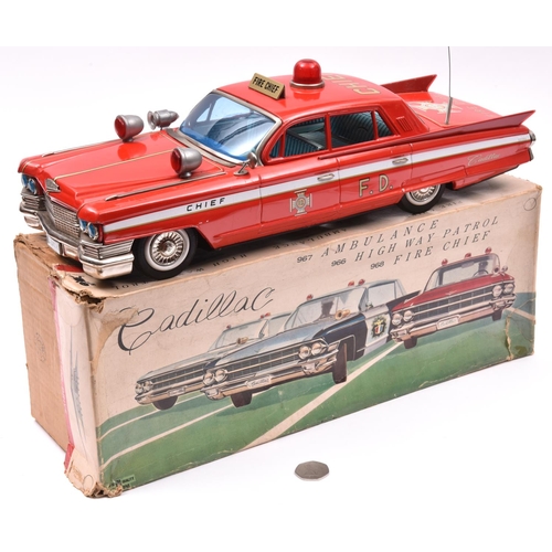 153 - An Impressively Large Japanese Bandai Tinplate Friction Powered Fire Chief Car. Very loosely based o... 