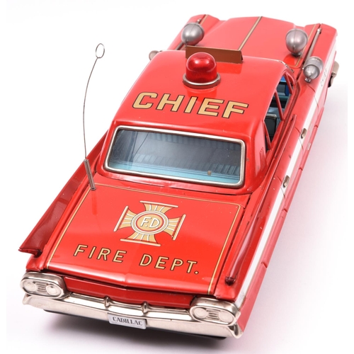 153 - An Impressively Large Japanese Bandai Tinplate Friction Powered Fire Chief Car. Very loosely based o... 