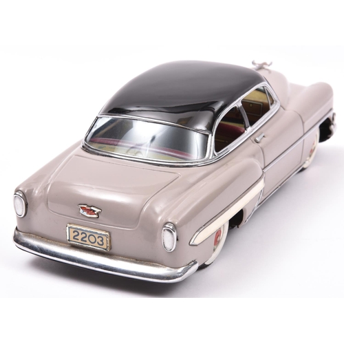 158 - A Japanese Tinplate Marusan Toys Kosuge (SAN) 1954 Chevrolet Bel-Air 2-Door Hardtop. A free wheel ex... 