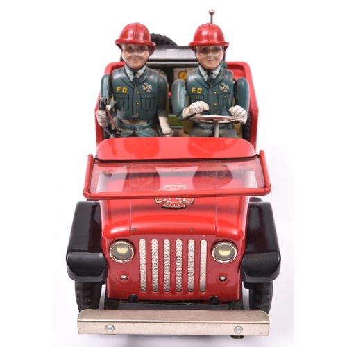 159 - A Japanese T.N. (Nomura) Tinplate Battery Powered 'Fire Dept. No.1' Jeep. A mystery action toy, fini... 