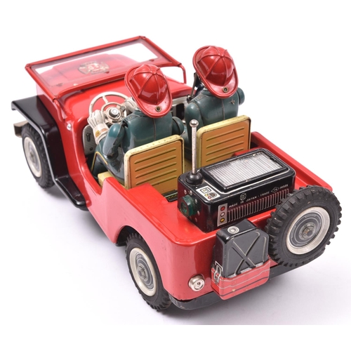 159 - A Japanese T.N. (Nomura) Tinplate Battery Powered 'Fire Dept. No.1' Jeep. A mystery action toy, fini... 