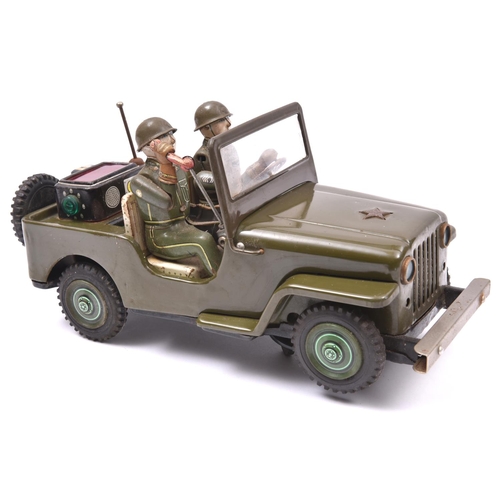 160 - A 1960's Japanese T.N. (Nomura Toys) U.S. Army Jeep. A battery powered example with 'mystery action'... 