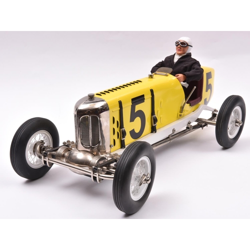 163 - A tinplate and die-cast 'Miller' single seat racing Car. Designed in the U.K. by Gilbow, this impres... 