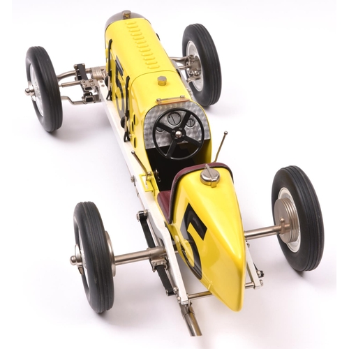 163 - A tinplate and die-cast 'Miller' single seat racing Car. Designed in the U.K. by Gilbow, this impres... 