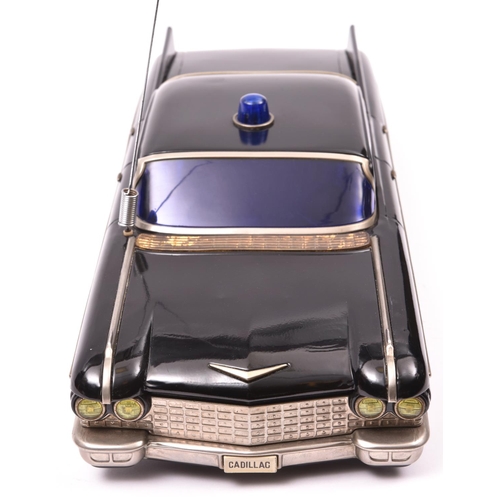 164 - An impressively Large Yone (Y) Tinplate Battery Powered 1960 Cadillac Coupe DeVille. Finished in glo... 