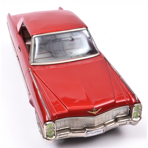 165 - An Impressively Large Ashai Tinplate Friction Powered Cadillac Coupe De Ville 2-Door Coupe. In metal... 