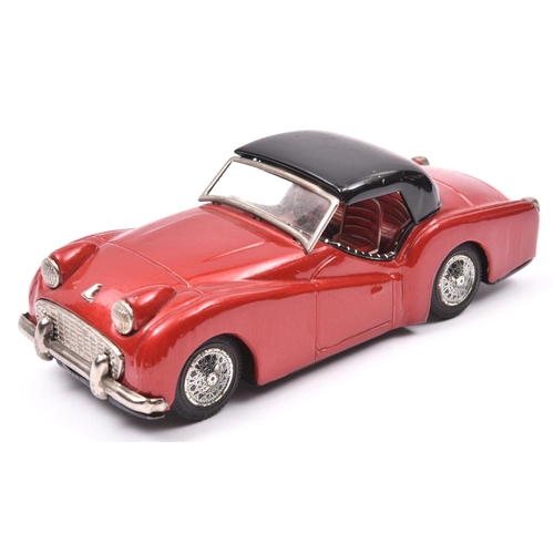 167 - Bandai Tinplate Friction Powered Triumph T.R.3. An example in metallic red with black roof, L.H.D. w... 