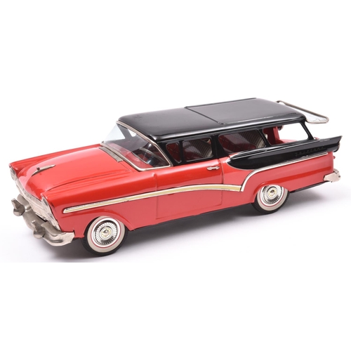 173 - Bandai Friction Powered 1957 Ford Fairlane Station Wagon. In bright red with black roof and black re... 