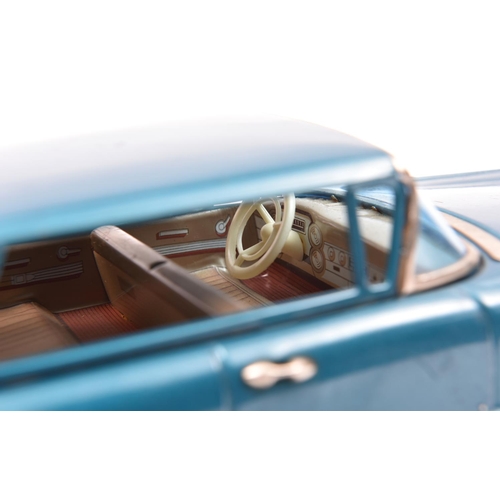 174 - Bandai Friction Powered 1962 Cadillac 'Flat Top' 4 Door Saloon. In dark metallic sea green, with tan... 