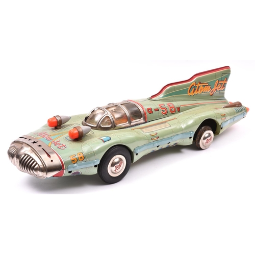 178 - A rare late 1950's Japanese Yonezawa Tinplate Atom Jet Racer. A streamlined science-fiction style sp... 