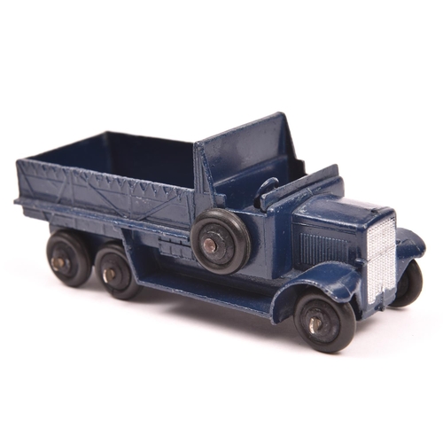 431 - Dinky Toys Six Wheeled Transport Wagon 25s. An example in dark R.N. blue with black ridged wheels. T... 