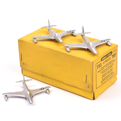 456 - A Trade Pack of Dinky Toys Shooting Star Jet Fighters. (733-70F). A complete set of 6 in silver with... 