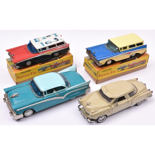 110 - 2 Japanese push along tinplate American Ford Fairlane Station Wagons. One in cream and mid blue with... 