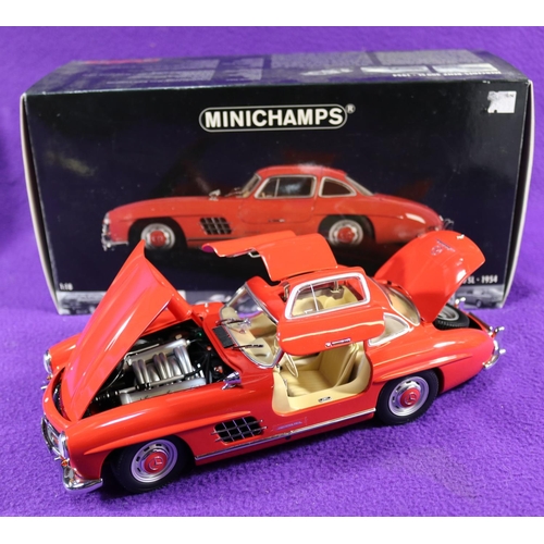 181 - Minichamps 1:18 1954 Mercedes-Benz 300SL 'Gull Wing'. An example in bright red with a tan interior, ... 