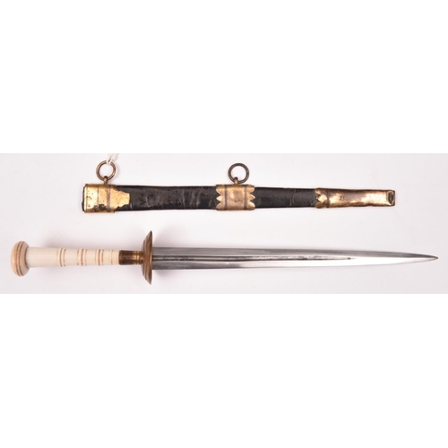 174 - A Georgian naval dirk, c 1800,  tapered 8½” DE blade with narrow fullers; gilt brass hilt with turne... 