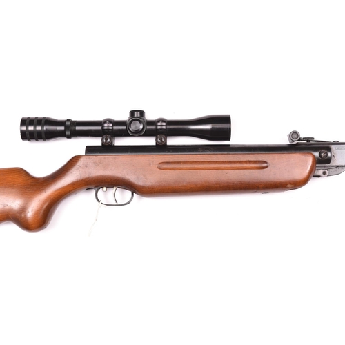 255 - A .22” Weihrauch HW35 break action air rifle,  number 590729, fitted with BSA 4x33 telescopic sight.... 