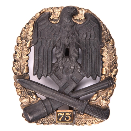 67 - A Third Reich General Assault badge with “75” tablet, gilt wreath with bronzed eagle, marked on reve... 