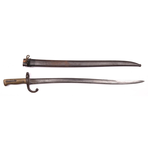 187 - A French M1866 Chassepot bayonet,  the blade engraved “Mre Rle de Chatt. Juillet 1871”, in its steel... 