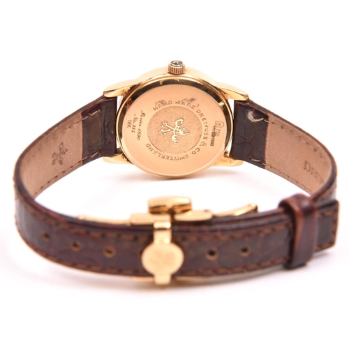 11 - A Dreyfuss & Co watch with quartz movement and 18ct gold case. Dreyfuss brown leather strap. With ca... 