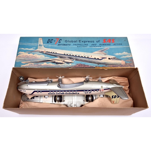 257 - An impressive T.N. of Japan tinplate battery powered 1950's DC-7C 4 engined airliner. An example fin... 