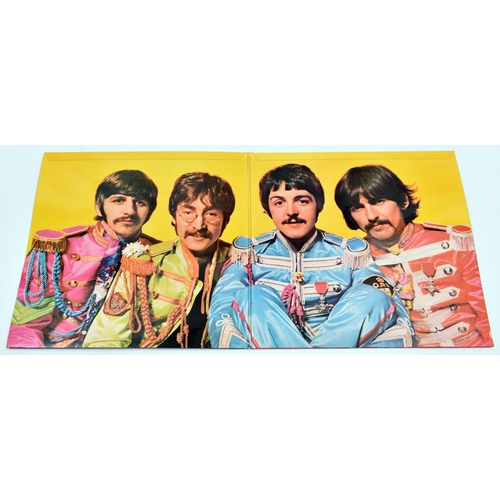 124 - The Beatles - Sgt. Pepper's Lonely Hearts Club Band. Parlophone stereo 12