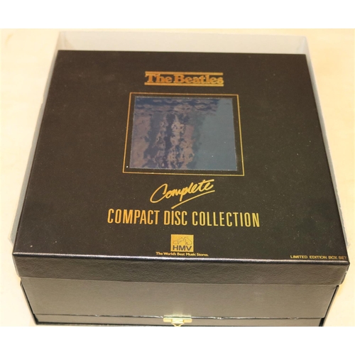 55 - A Beatles 15 album CD box set. Limited edition set produced in 1988 by HMV with tray below containin... 