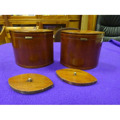 46 - A pair of marquetry tea caddies. Decorative shells to hinged lids and flowers and stringing to front... 