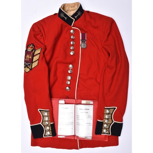 157 - A good post 1953 Regimental Sergeant Major's scarlet tunic of the Welsh Guards, fine QC arm badge,  ... 