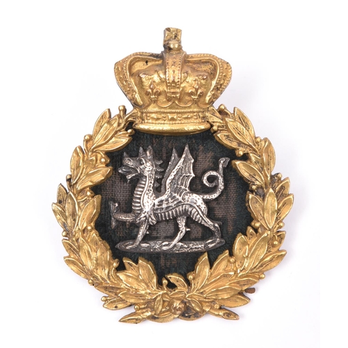 140 - A Victorian South Wales Borderers officer’s gilt and silver forage cap badge. GC £50-60