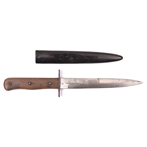 176 - A German WWII fighting knife, blade 6¾” bearing inspection mark on one side, the other side etched “... 