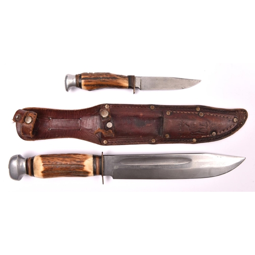 177 - A large German hunting knife,   broad blade 8”, by Baron, Solingen, with staghorn grip, in its leath... 