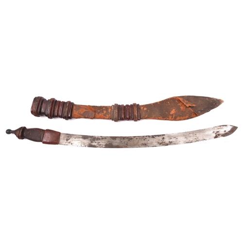 178 - An African Malinke (Mandingo) sword,  broad slightly curved blade 23