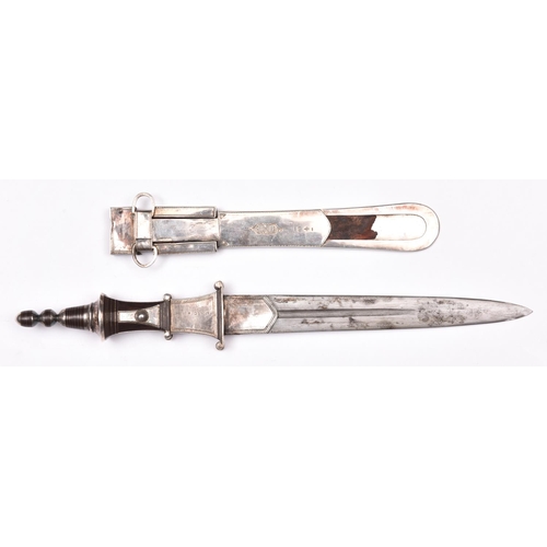 184 - A North African knife, tapered double edged blade 7½” with central fullers, in its sheath, the sheat... 