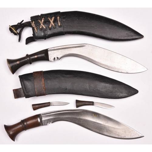 196 - A kukri, with plain horn grips and brass pommel cap, in its leather covered sheath; and another, wit... 