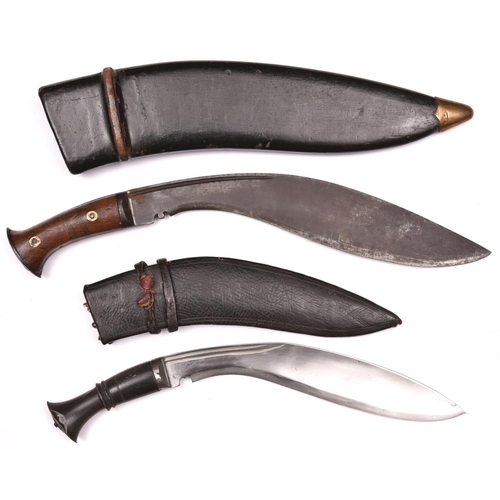 202 - A kukri,   with riveted wood grips, the blade stamped “J.N.B.43”, in its black leather covered sheat... 