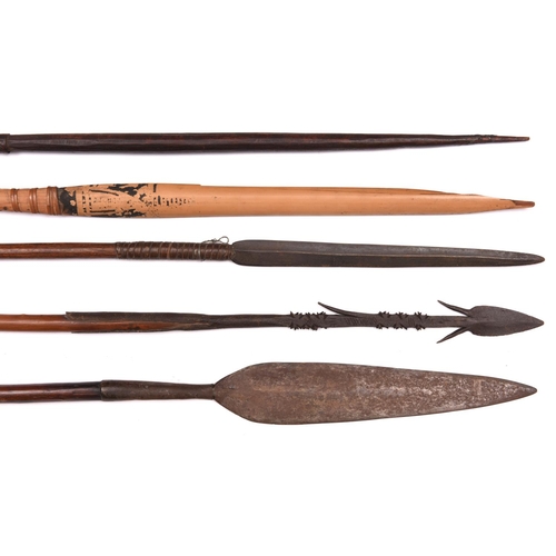 205 - 5 spears: African throwing spear, with slender 10½” blade, hide binding, and slender haft; African w... 