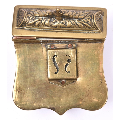 224 - A Turkish or Balkan brass cartridge box (cartouche), with hinged lid, embossed overall with flowers ... 