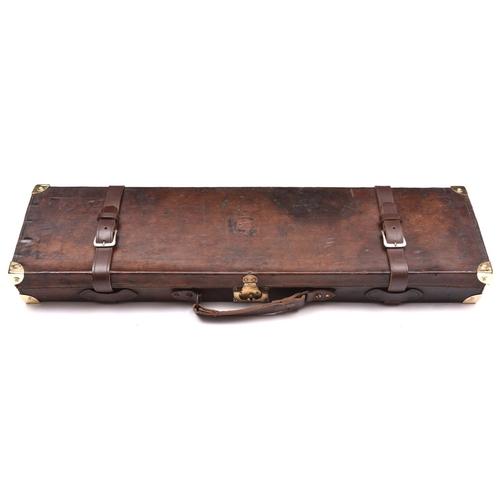 227 - A leather covered gun case, with later replacement brass bound corners, for a DB gun with 30” barrel... 